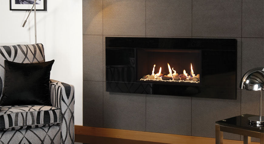 Gazco Studio 1 Glass gas fire Conventional Flue, with Pebble and White Stone fuel bed and Black Reeded lining with Linea Negro Tile Surround
